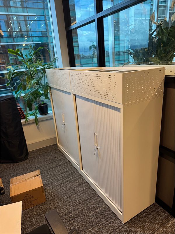 Tambour cabinets with matching planter boxes